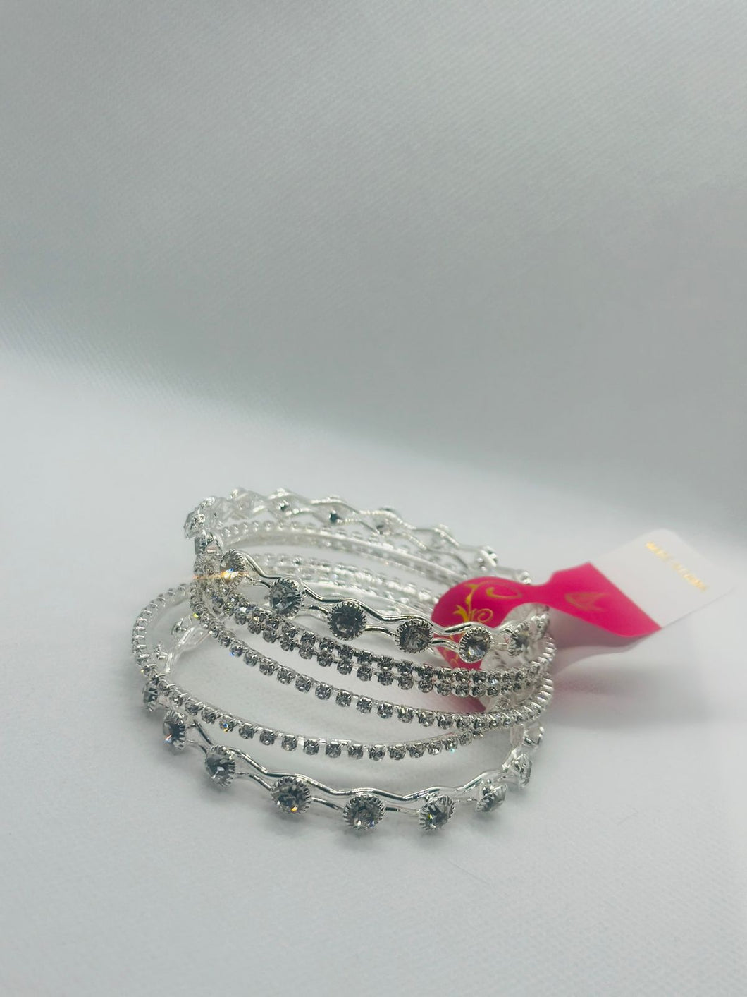 Radiant Shine: Silver Zirconia Bangle Collection